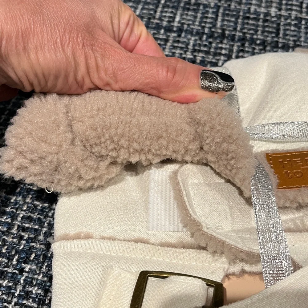 Dog jacket Sherpa lined with buckle neck closure. Cream color tan detailing. XS